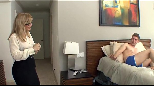 Busty cougar Hartley fucks a young guy